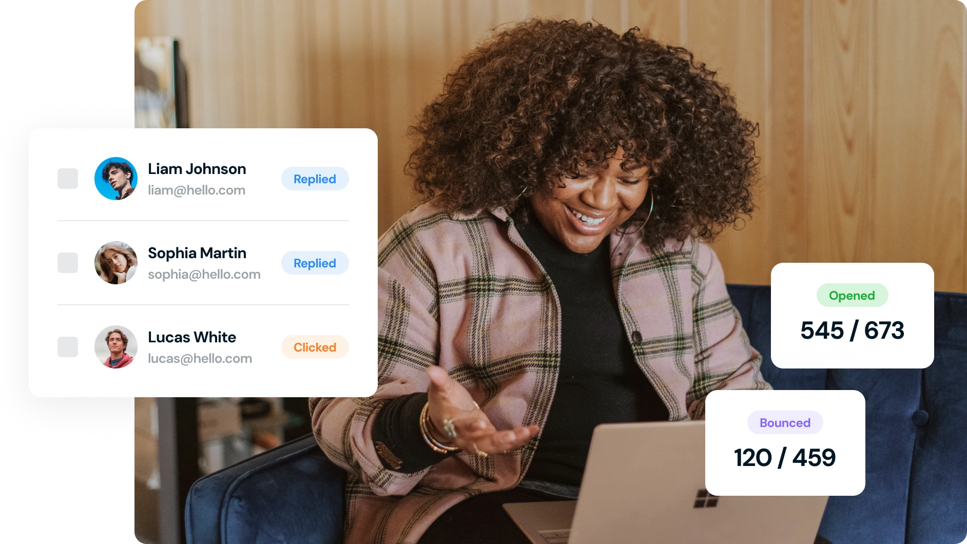 Woman using a laptop with email notifications displayed on screen